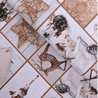 Obrázok ku produktu DEKORAČNÁ LÁTKA vianočná béžová hnedá biela