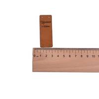 Obrázok ku produktu NÁŠIVKA Vyrobené s láskou hnedá 6x2cm hore