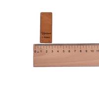 Obrázok ku produktu NÁŠIVKA Vyrobené s láskou hnedá 6x2cm dole