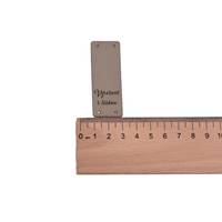 Obrázok ku produktu NÁŠIVKA Vyrobené s láskou béžová sivá  6x2cm dole