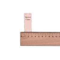 Obrázok ku produktu NÁŠIVKA Vyrobené s láskou béžová 6x2cm hore